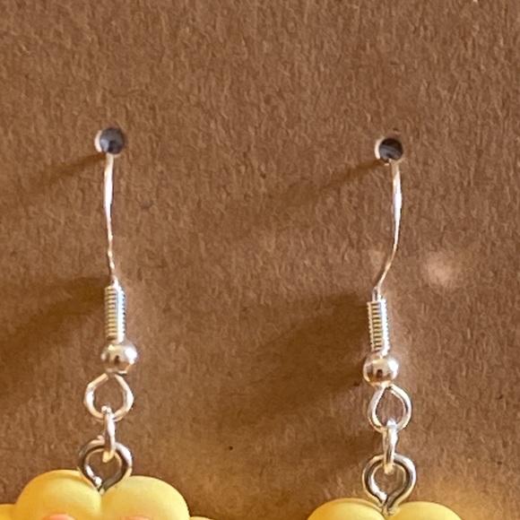 Orange and yellow dog paw earrings with silver wires and random gift bag - Picture 3 of 5